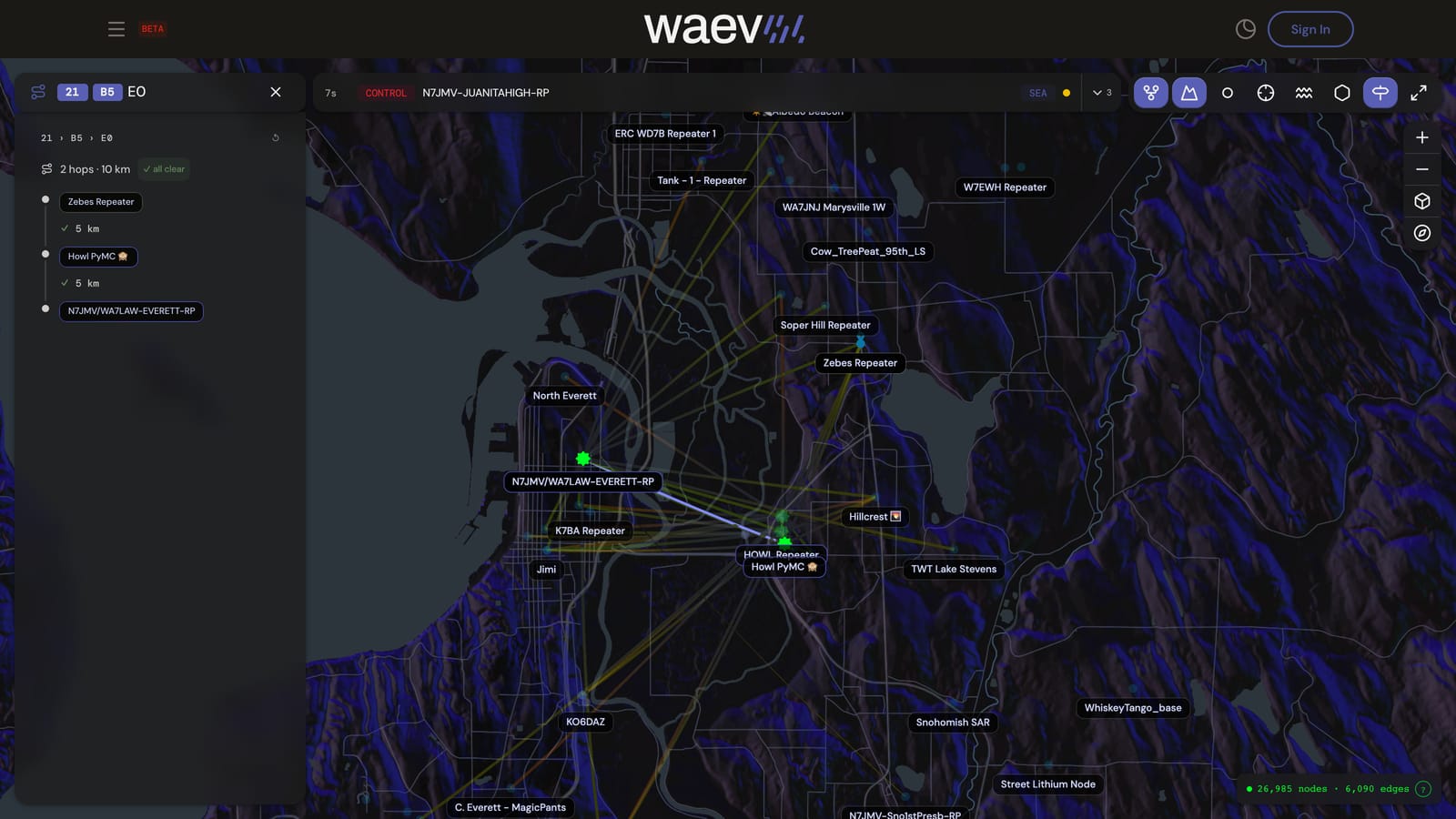 The Waev Live Map walking a MeshCore path: hop chips for each resolved node, a shelf grading the two-hop chain, and arcs connecting repeaters near Everett, Washington.